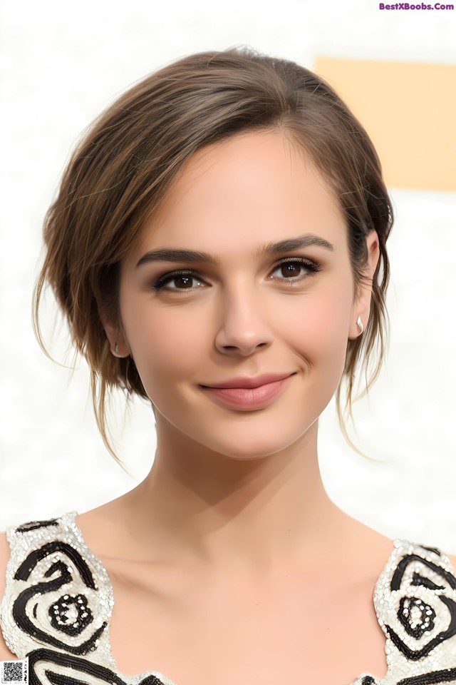 A close up of a woman in a black and white dress.